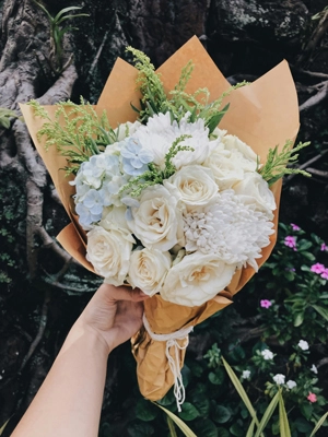 white sympathy flower bouquet